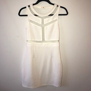 Tight white dress with sheer open back